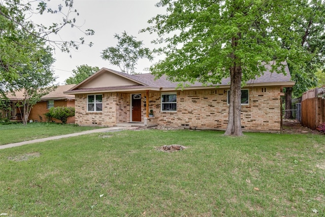 single story home featuring a front yard