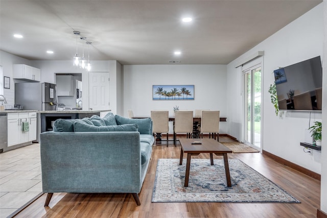 living room featuring light wood-type flooring