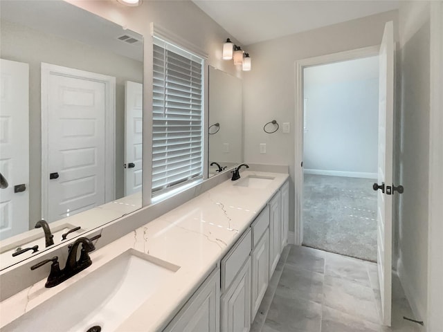 bathroom featuring vanity