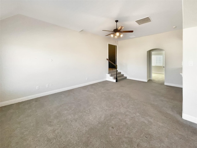 carpeted empty room with ceiling fan