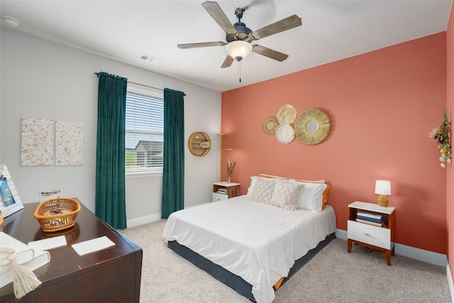 bedroom featuring a ceiling fan, carpet, visible vents, and baseboards