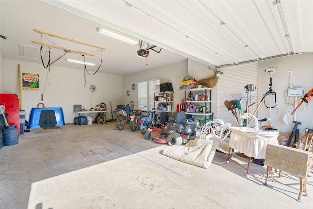 garage featuring a garage door opener