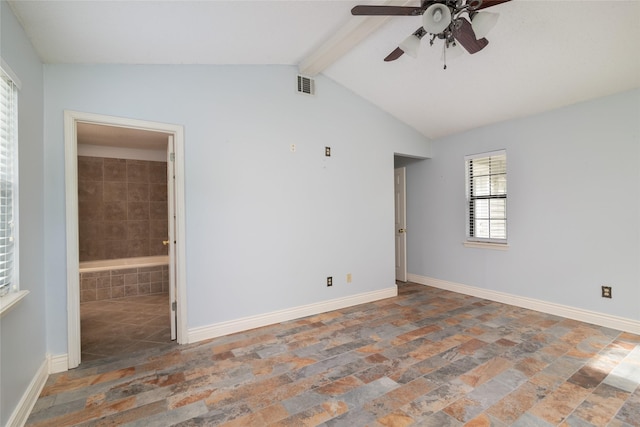 spare room with vaulted ceiling with beams and ceiling fan