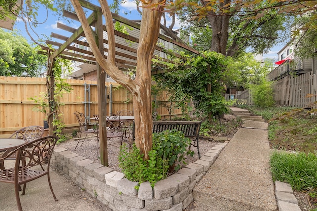 view of patio / terrace featuring a pergola