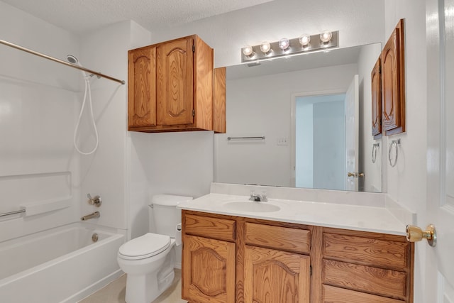 full bathroom featuring bathing tub / shower combination, vanity, a textured ceiling, and toilet