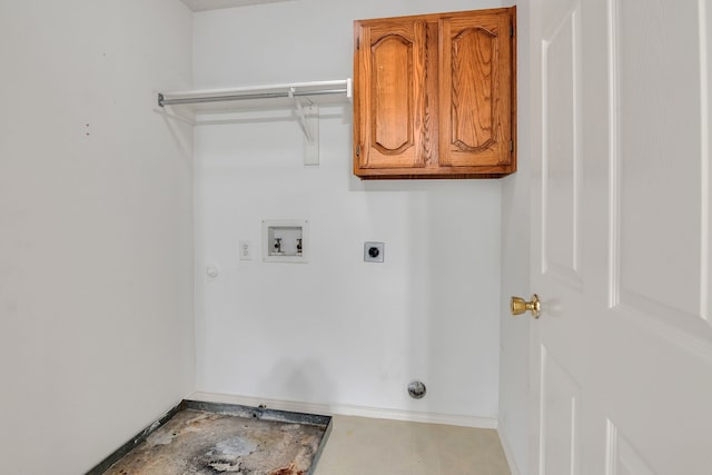 laundry room featuring washer hookup, gas dryer hookup, hookup for an electric dryer, and cabinets