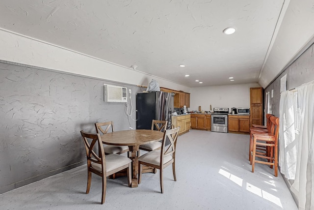 dining room with lofted ceiling and a wall mounted air conditioner