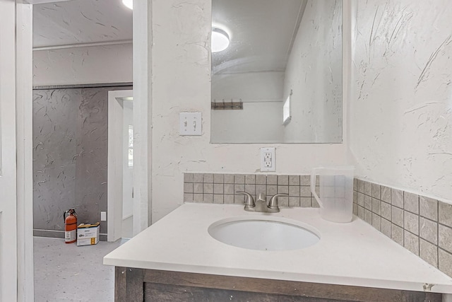 bathroom with backsplash and vanity