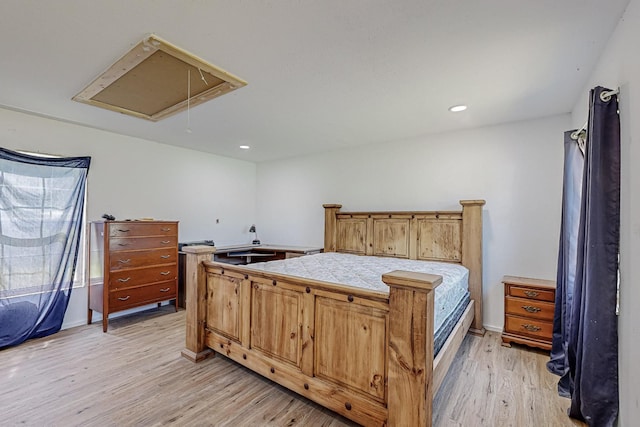 bedroom with light hardwood / wood-style floors