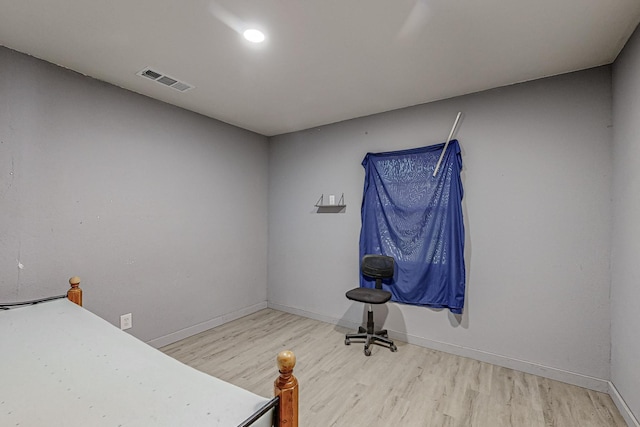 bedroom featuring light wood-type flooring