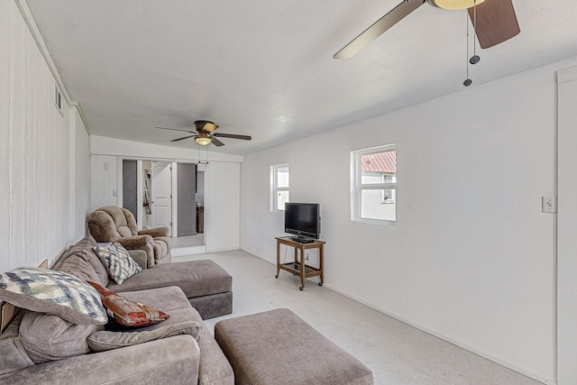 living room featuring ceiling fan