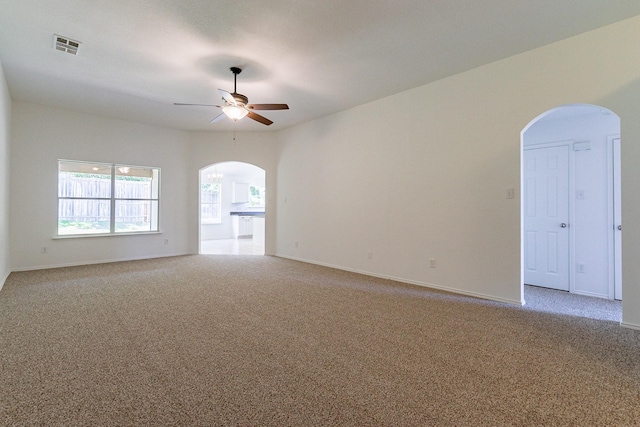 carpeted empty room with ceiling fan