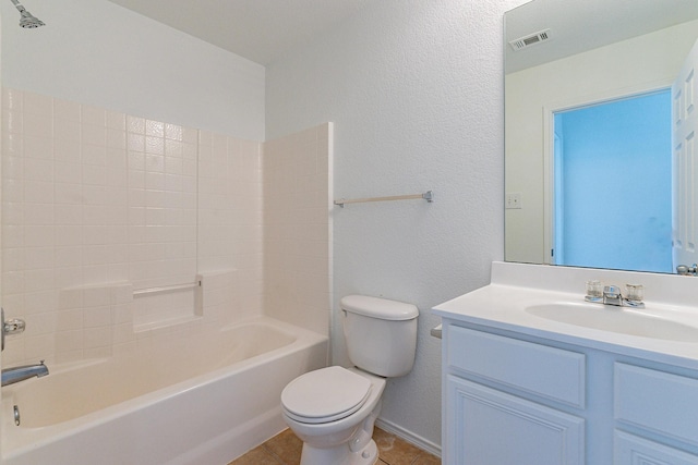 full bathroom featuring tile patterned floors, toilet, shower / bathing tub combination, and vanity