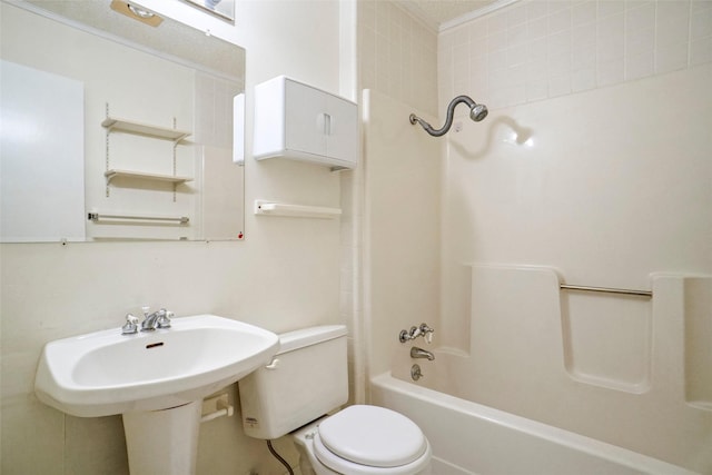 bathroom with shower / bath combination, toilet, and ornamental molding