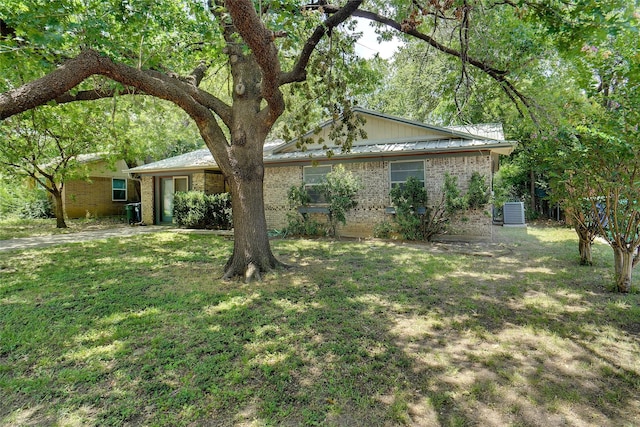 exterior space featuring central AC unit