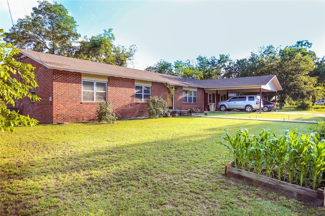 ranch-style house with a front lawn and a carport