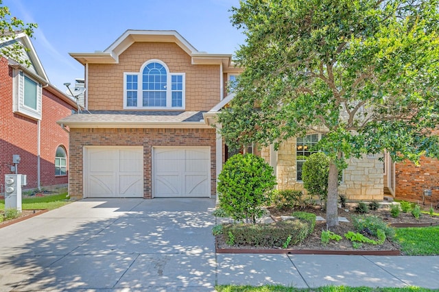 view of front of property featuring a garage