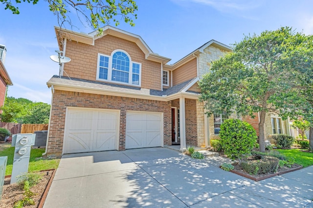 view of front of home with a garage