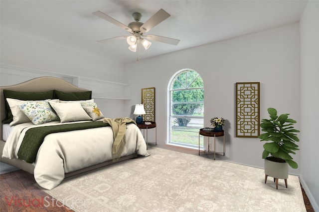 bedroom with ceiling fan and wood-type flooring