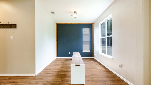 interior space with hardwood / wood-style flooring