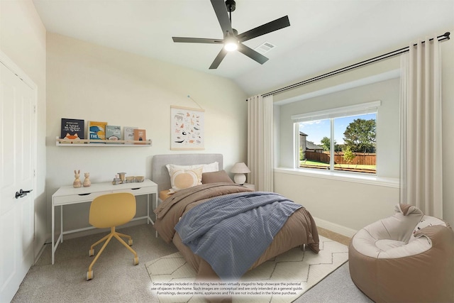carpeted bedroom with baseboards, vaulted ceiling, ceiling fan, and visible vents