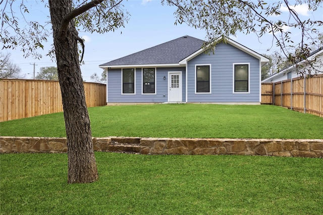 view of front of home with a front yard