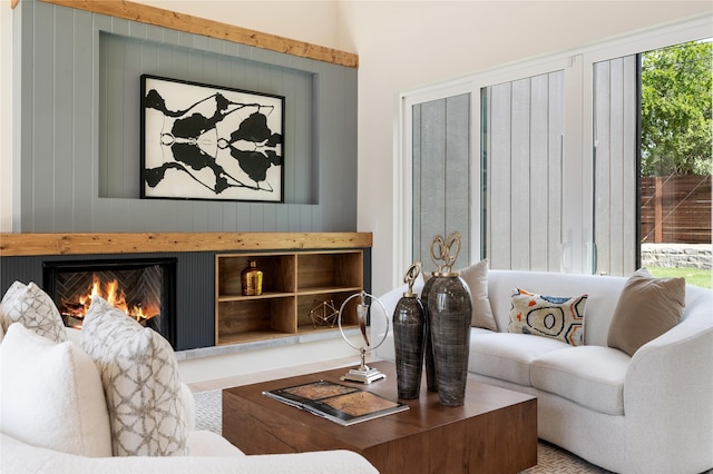 living room featuring wood walls