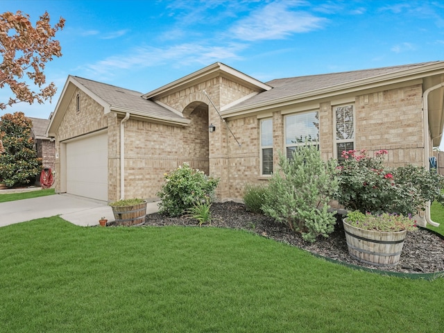 ranch-style house with a front lawn and a garage