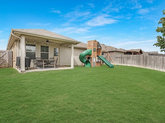 exterior space with a yard, a patio, and ceiling fan