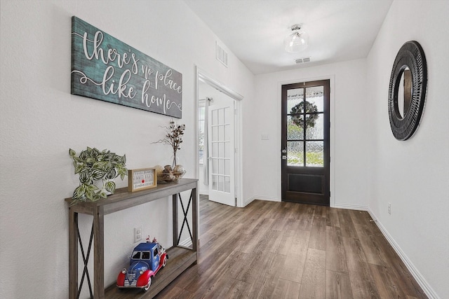 entrance foyer featuring hardwood / wood-style floors