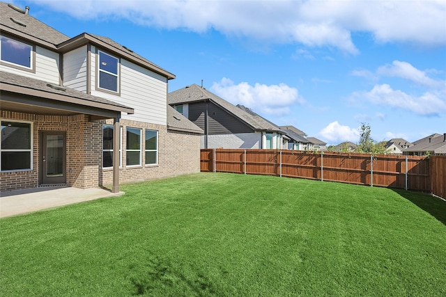 view of yard with a patio area