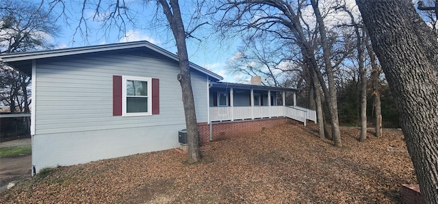 view of home's exterior featuring a porch