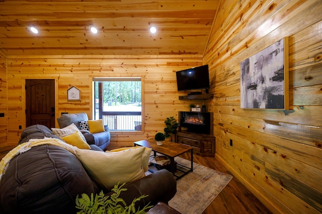 living room featuring wood ceiling, wood walls, vaulted ceiling, and hardwood / wood-style floors