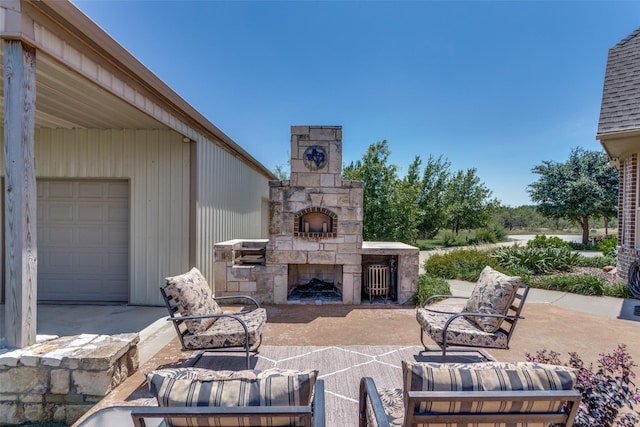 view of patio with an outdoor stone fireplace