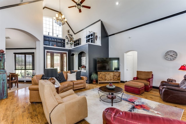 living room with hardwood / wood-style flooring, a chandelier, and a wealth of natural light