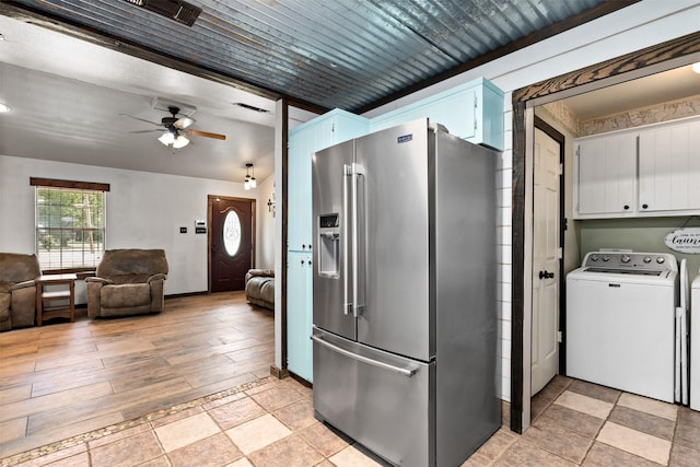 kitchen with white cabinets, ceiling fan, light hardwood / wood-style floors, stainless steel fridge with ice dispenser, and washer / clothes dryer