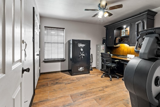 office featuring ceiling fan and light hardwood / wood-style flooring