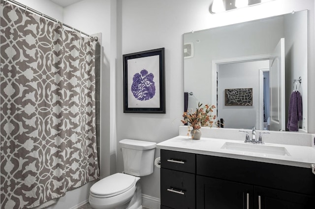 full bathroom with shower / bath combo, vanity, and toilet