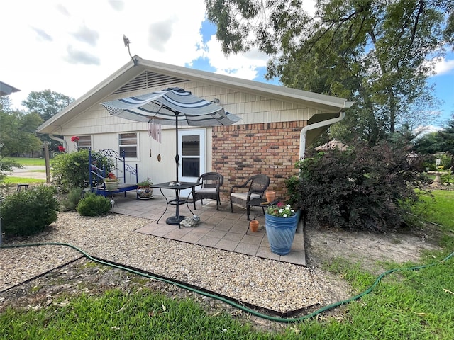 back of property with a patio area