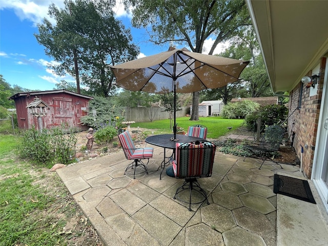 view of patio / terrace with a storage unit