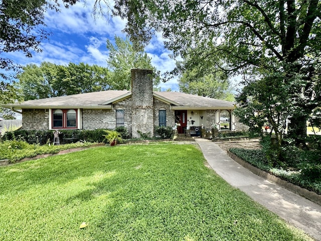 ranch-style house with a front yard