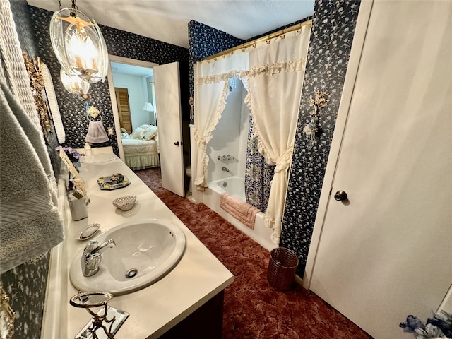 bathroom featuring shower / bath combination with curtain and vanity