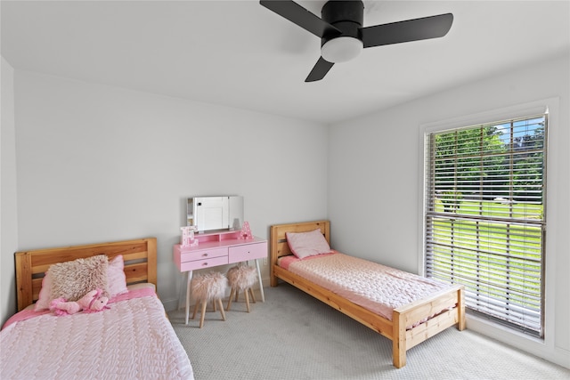 bedroom featuring ceiling fan and carpet floors