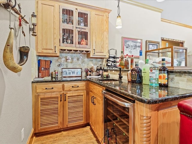 bar featuring dark stone counters, wine cooler, light hardwood / wood-style flooring, tasteful backsplash, and hanging light fixtures