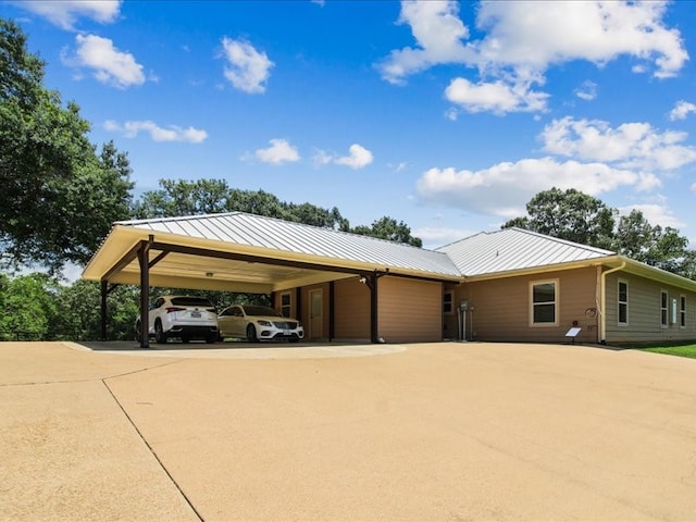 view of front of property with a carport