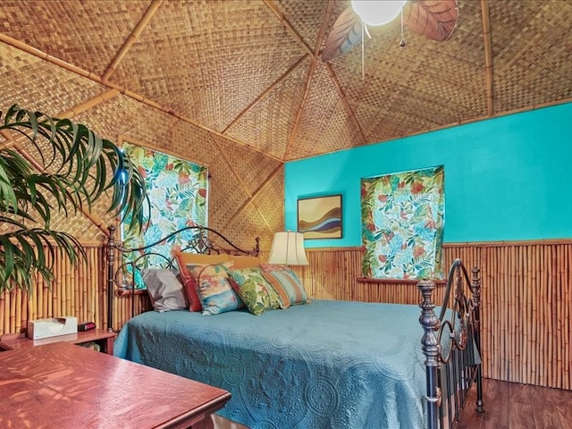 bedroom with ceiling fan and hardwood / wood-style flooring