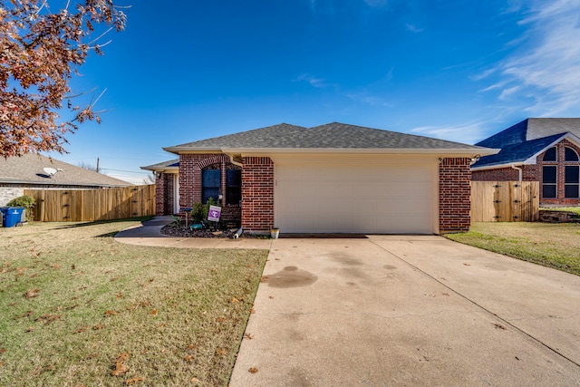 ranch-style house with a garage and a front lawn