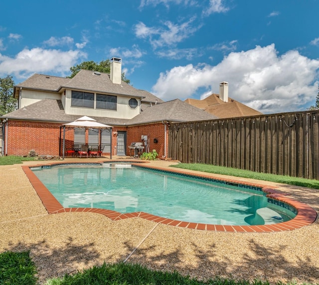 view of pool with a gazebo and a patio