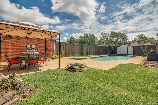 view of pool with a gazebo, a patio, a storage shed, and a lawn