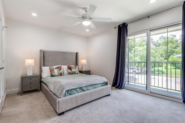 bedroom featuring access to outside, ceiling fan, and light colored carpet